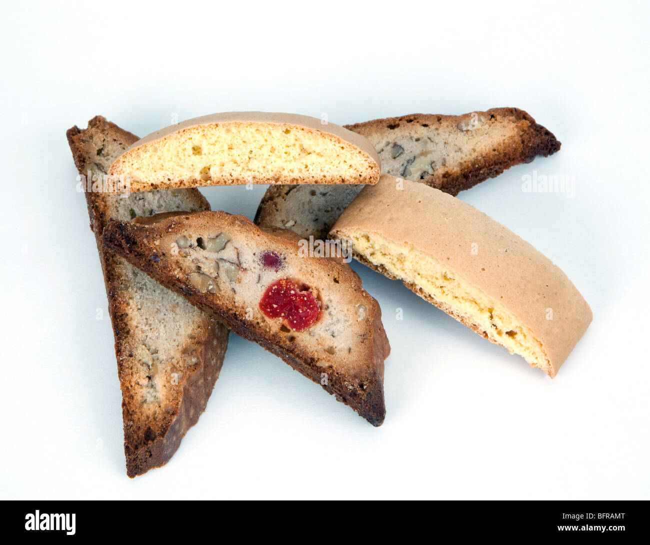 Fruit and plain biscotti biscuits shot against a white background Stock
