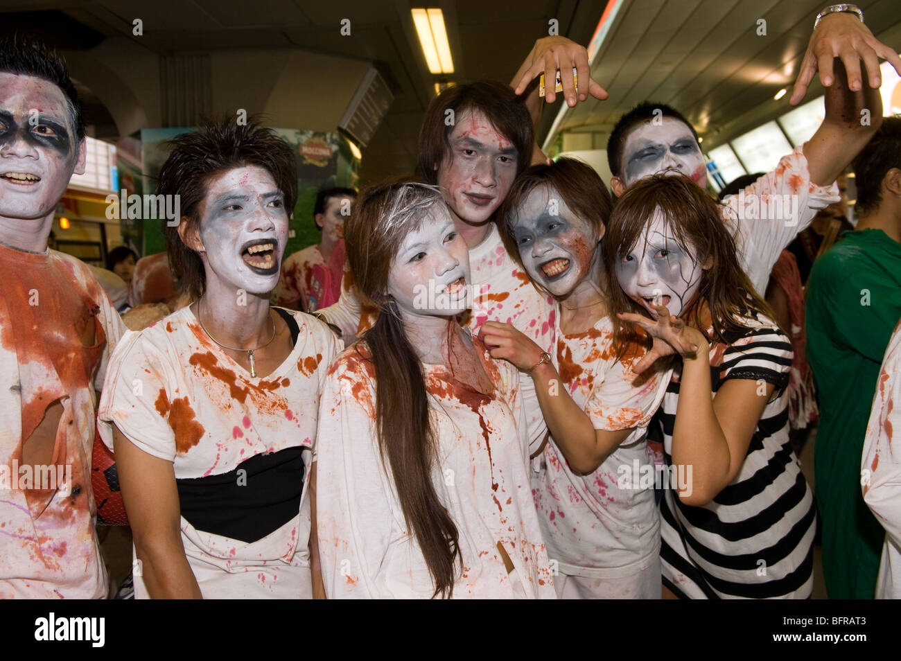 Crazy zombies at zombie walk festival at Siam BTS, Bangkok, Thailand. Stock Photo