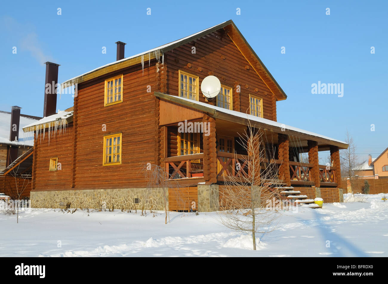 Wooden house in the winter Stock Photo