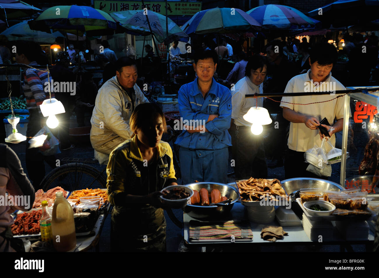People buying prepared foods in Shanghai, China.12-Oct-2009 Stock Photo