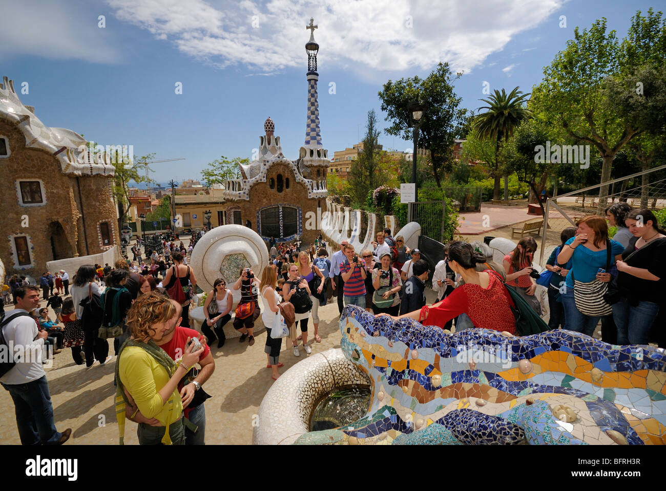 Parque Guell, Park Guell, by Antoni Gaudi, entrance, fountain, tourists, stairs, Barcelona, Catalonia, Spain, Europe. Stock Photo