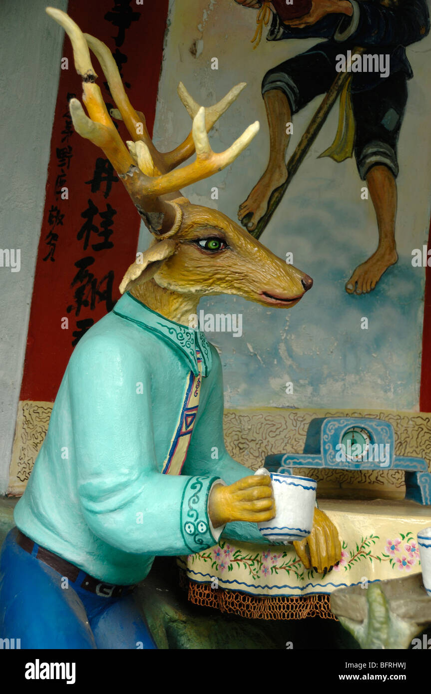 Deer Drinking Tea at a Kitchen Table, Tiger Balm Gardens Theme Park