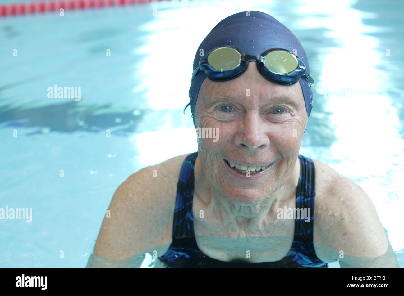 mature woman in swimming pool Stock Photo