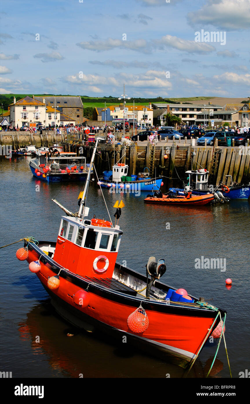 Fishing boats in the harbour at West Bay, Dorset, England Stock Photo ...