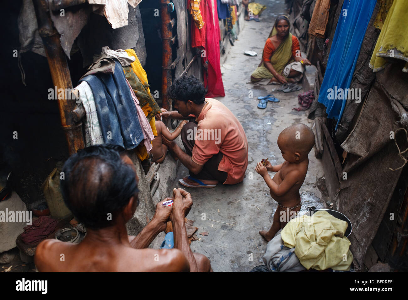 A scene from a daily life of a family living in one of the slums in Kolkata, India Stock Photo