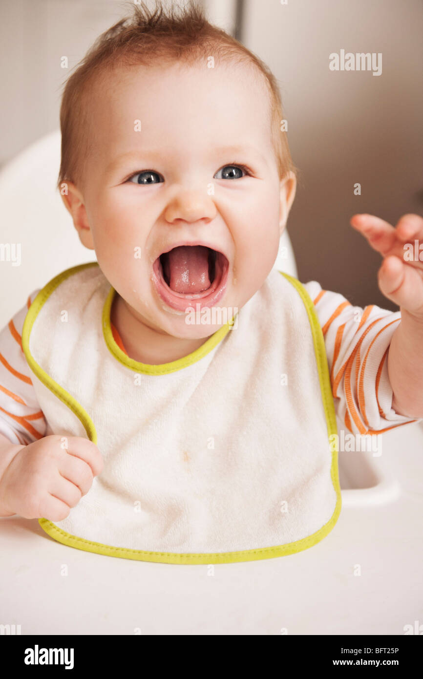 Baby in High Chair Stock Photo Alamy