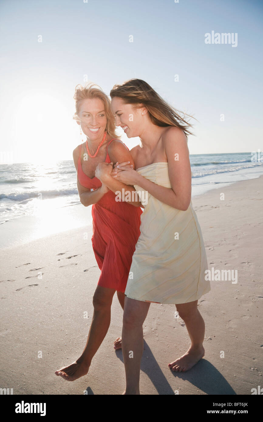 Women Walking on Beach, Florida, USA Stock Photo