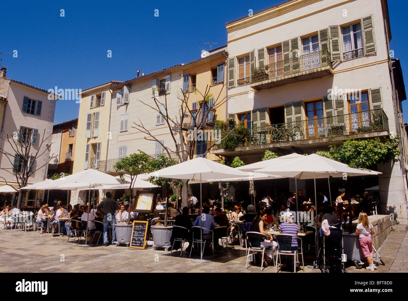 Open air restaurant and cafe in the village of Valbonne near Cannes Stock Photo