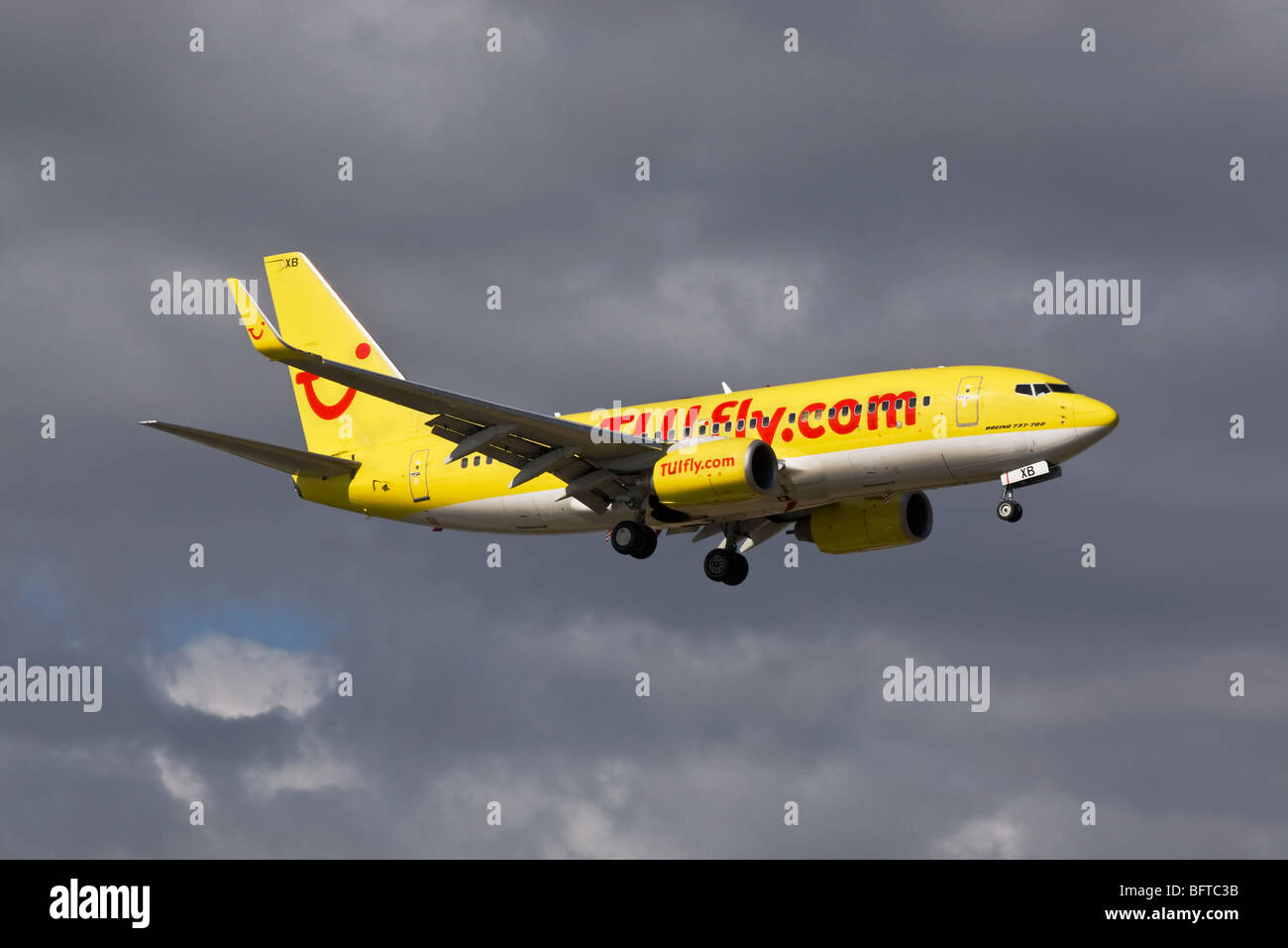 A Boeing B737 series 700 of the German holiday airline TUI Fly on final approach Stock Photo