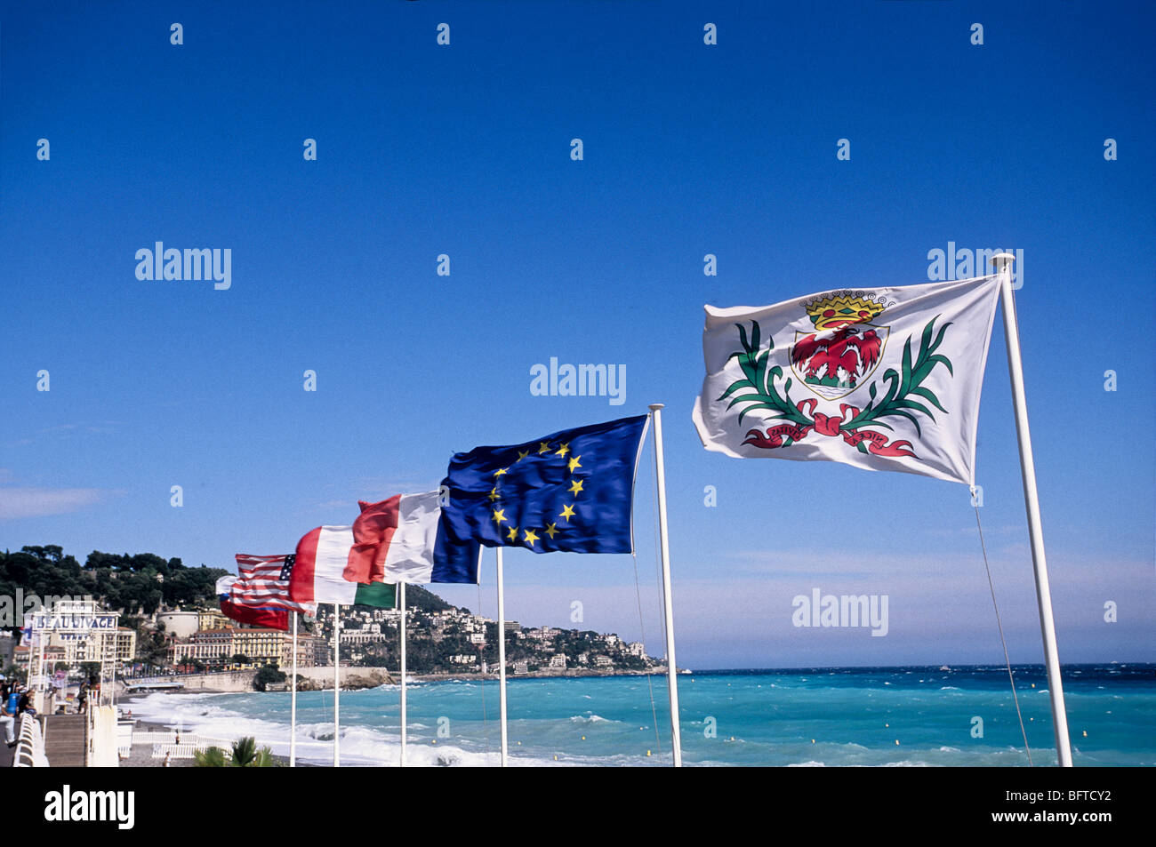 Differents flags on the Promenade des Anglais in Nice Stock Photo