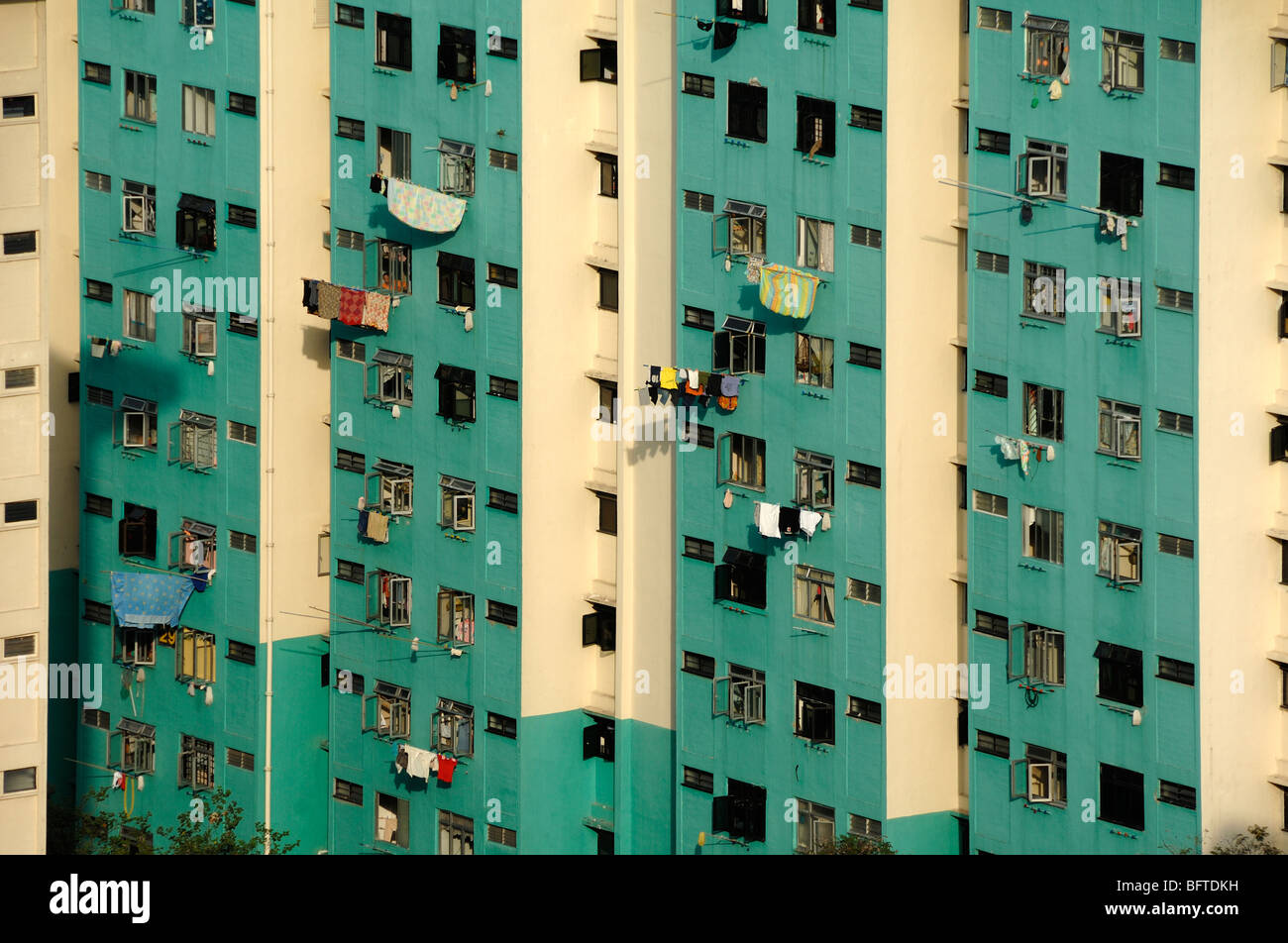 Washing or Laundry Hanging from Low-Cost Housing, Tower Blocks, High Rises, Flats, Apartments or Apartment Blocks, Singapore Stock Photo