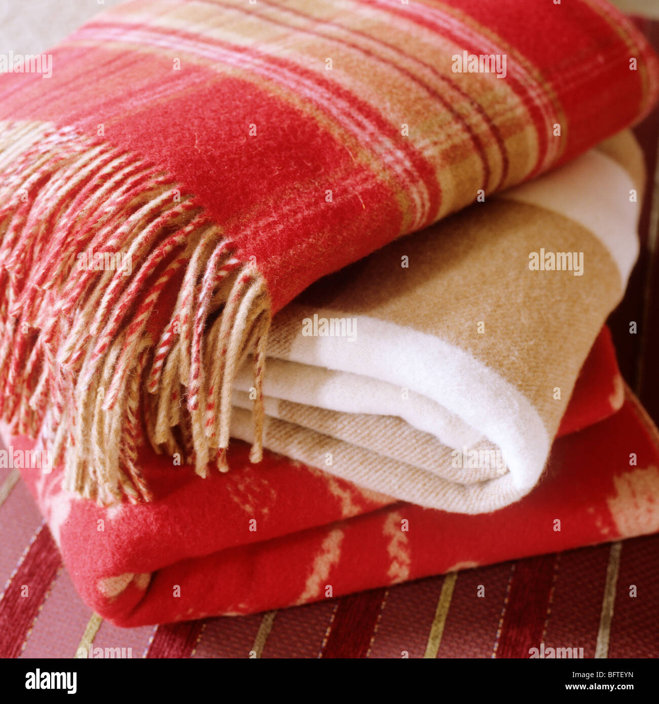 Pile of folded tartan blankets Stock Photo Alamy