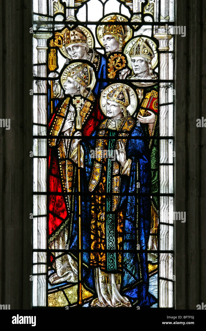 Detail of a stained glass window depicting Saints Augustine Birinius, Paulinus, Osmund and one other saint Stock Photo