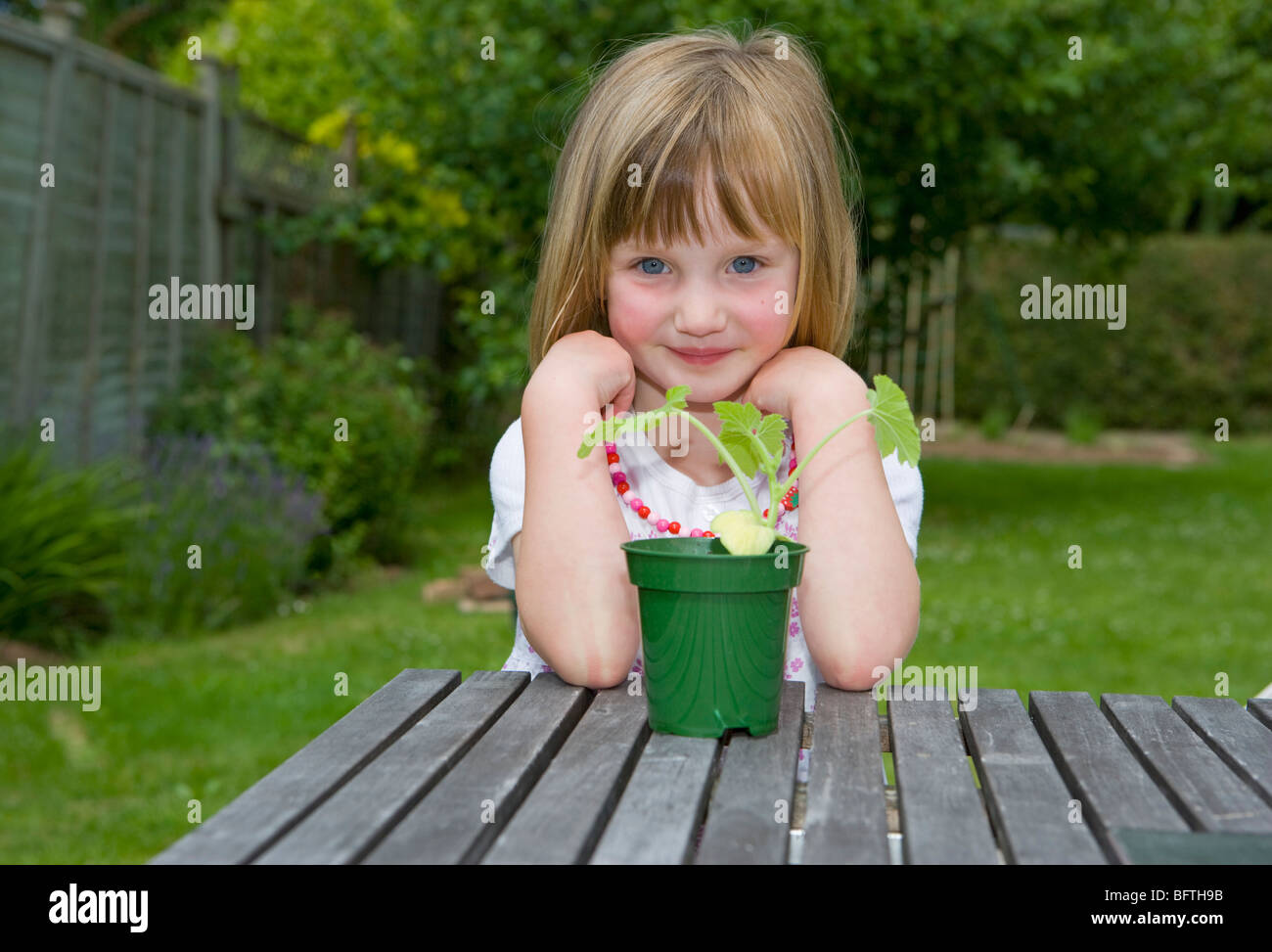 girl with plant Stock Photo - Alamy