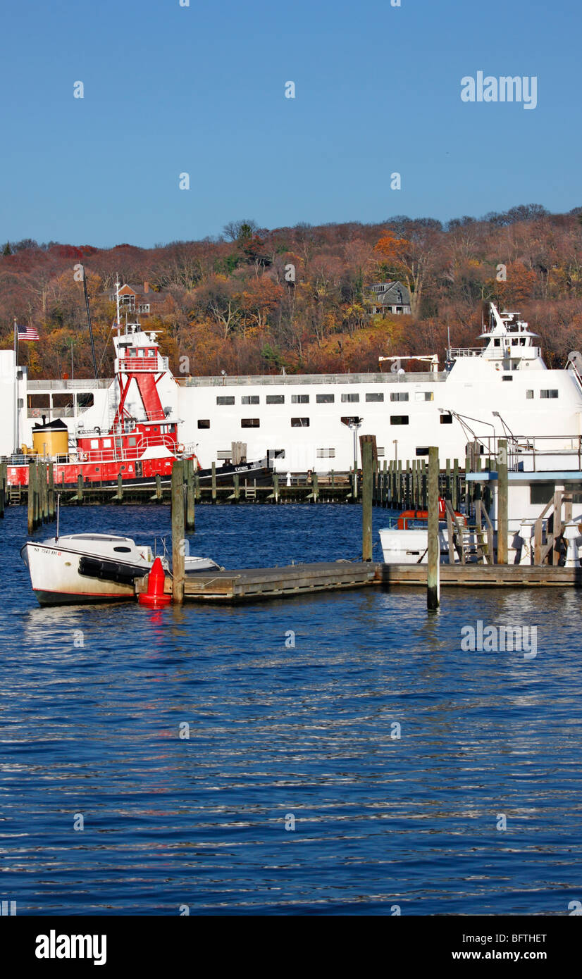 Car ferry and tugboat in harbor, Port Jefferson, Long Island, NY Stock