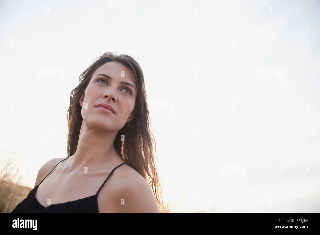 woman walking on the beach Stock Photo