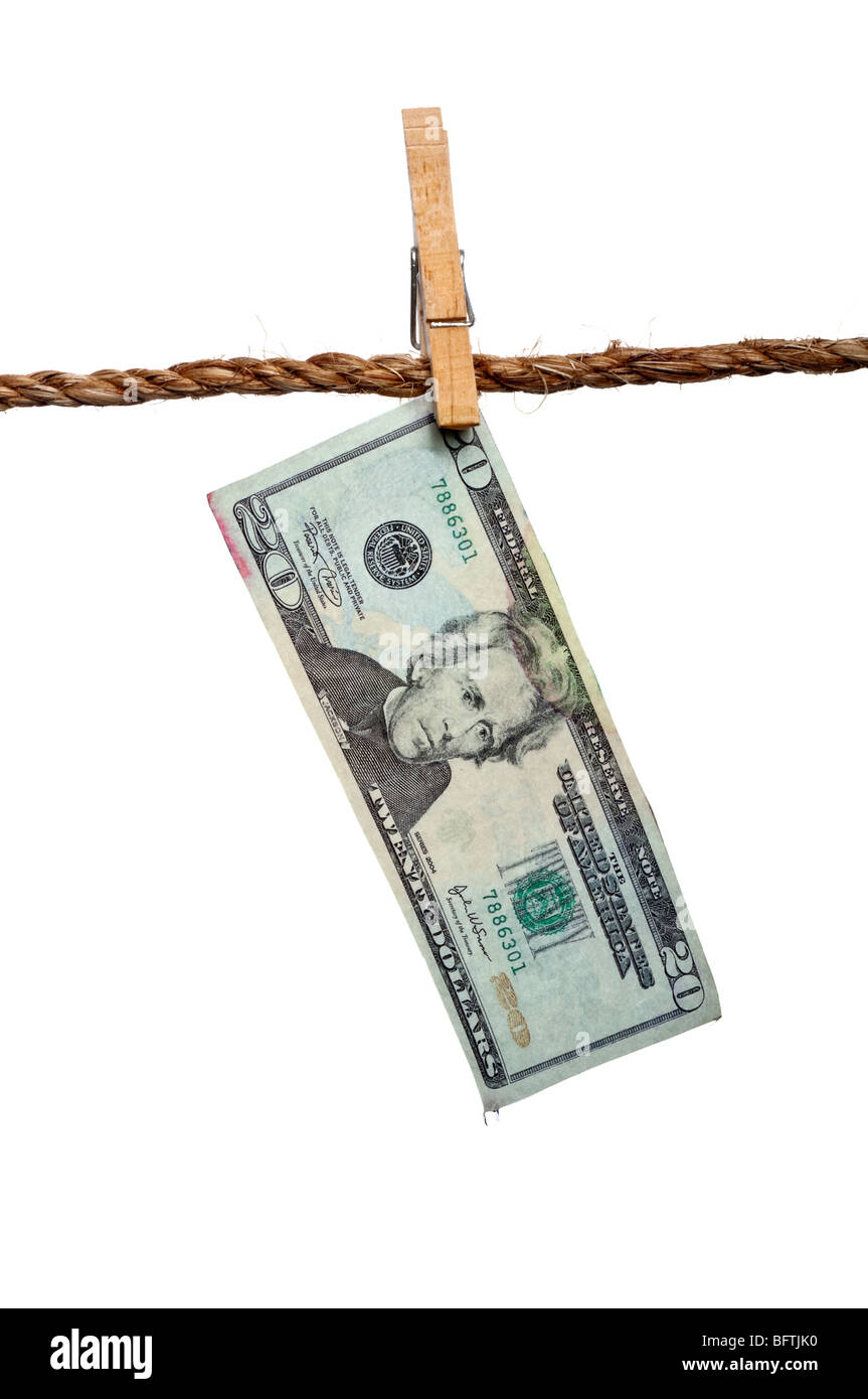 A dripping 20 dollar bill on a clothesline: money laundering concept Stock Photo