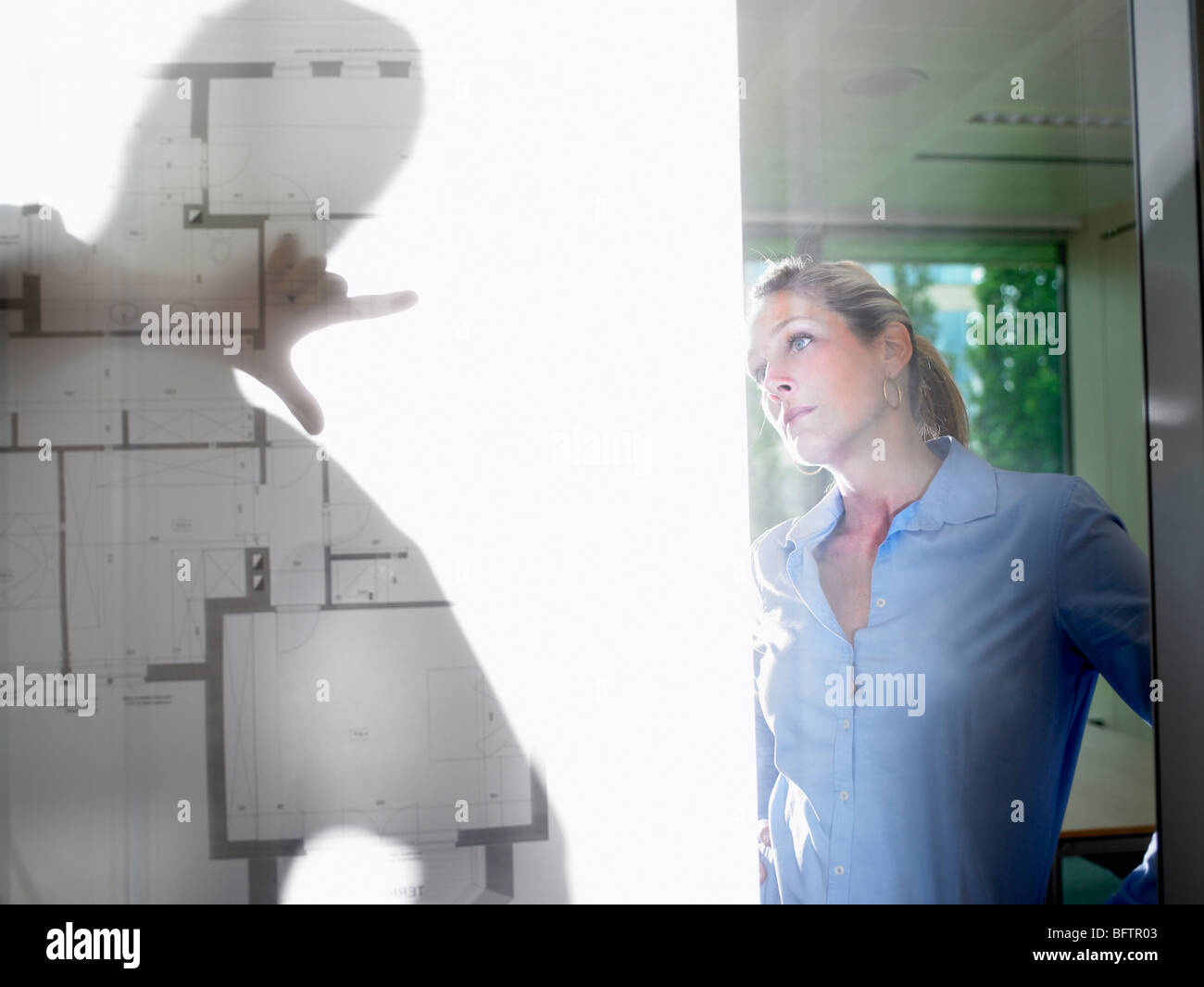 Woman showing prints hi-res stock photography and images - Alamy