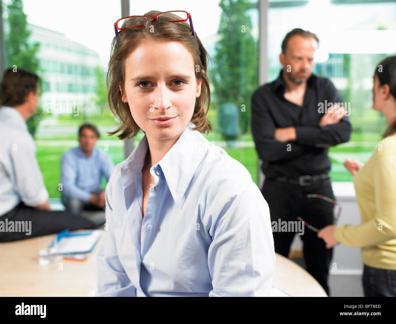 Business woman looking at camera Stock Photo