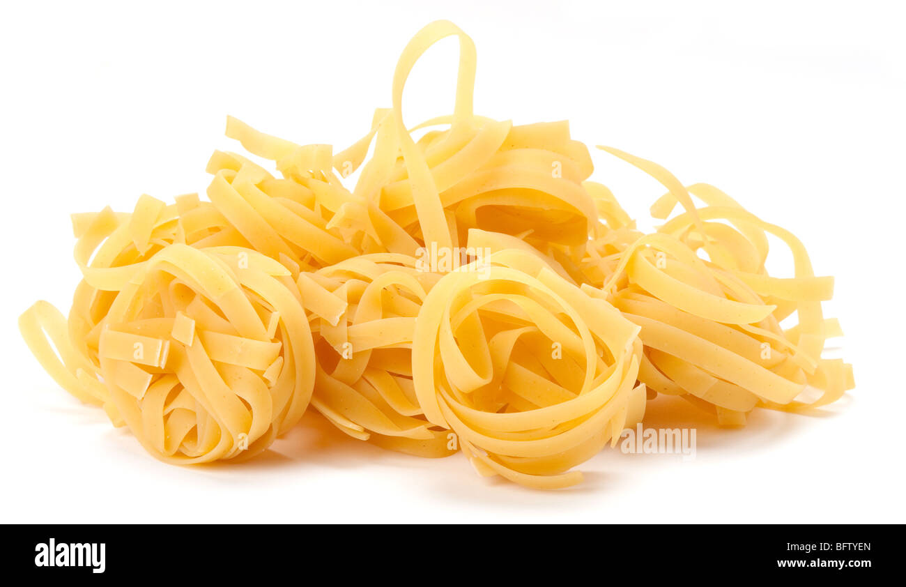curly pasta isolated on white Stock Photo Alamy