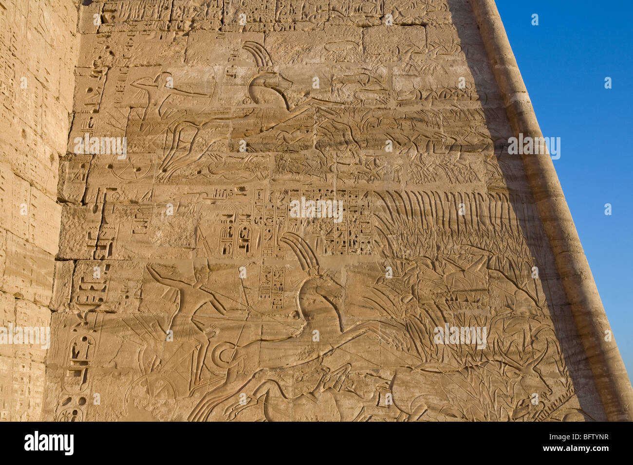Close up of reliefs on First Pylon at Medinet Habu , Mortuary Temple of ...