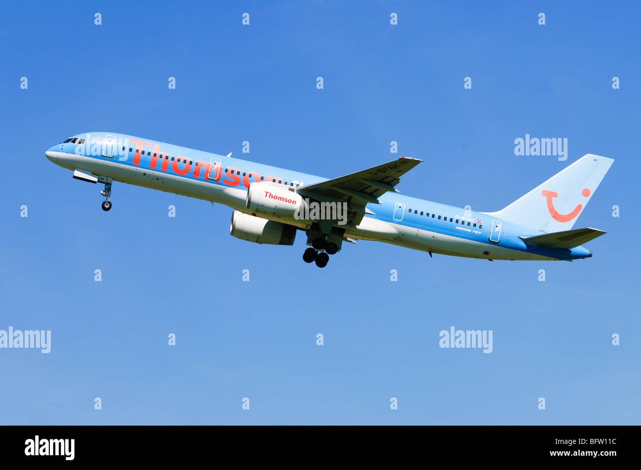 Boeing 757 operated by Thomson Airways climbing out from take off at Birmingham Airport, UK. Stock Photo