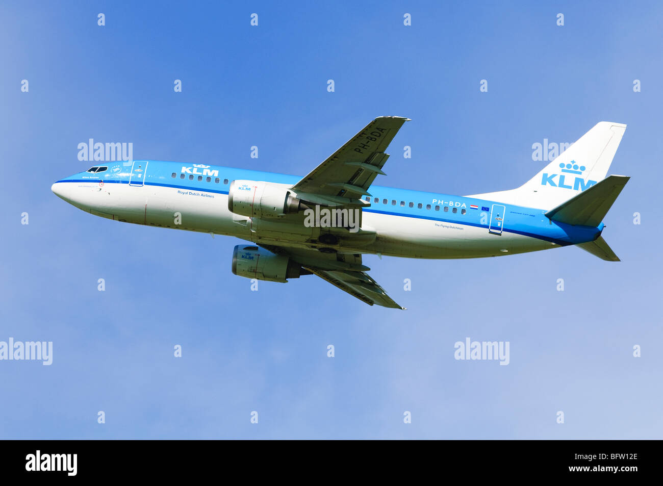 Boeing 737 operated by KLM climbing out from take off at Birmingham Airport, UK. Stock Photo