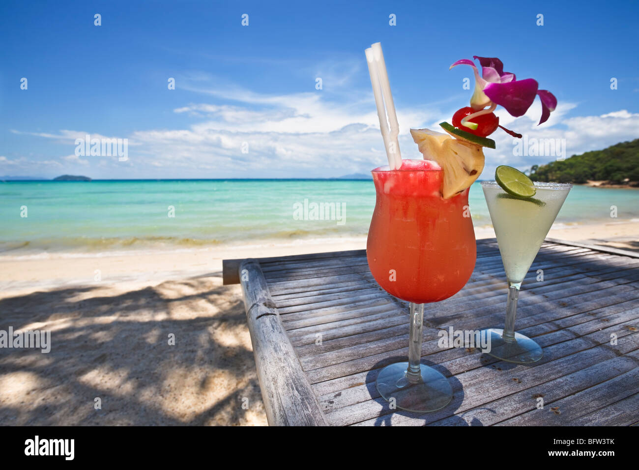 Couple of cocktails with a beautiful beach in the background Stock Photo picture