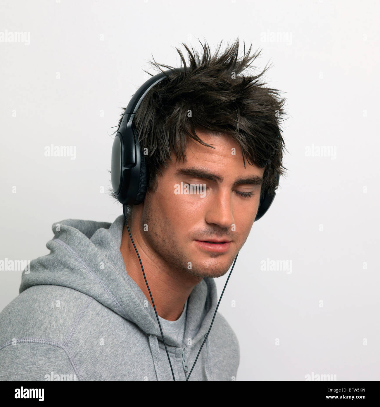 young man listening to music Stock Photo