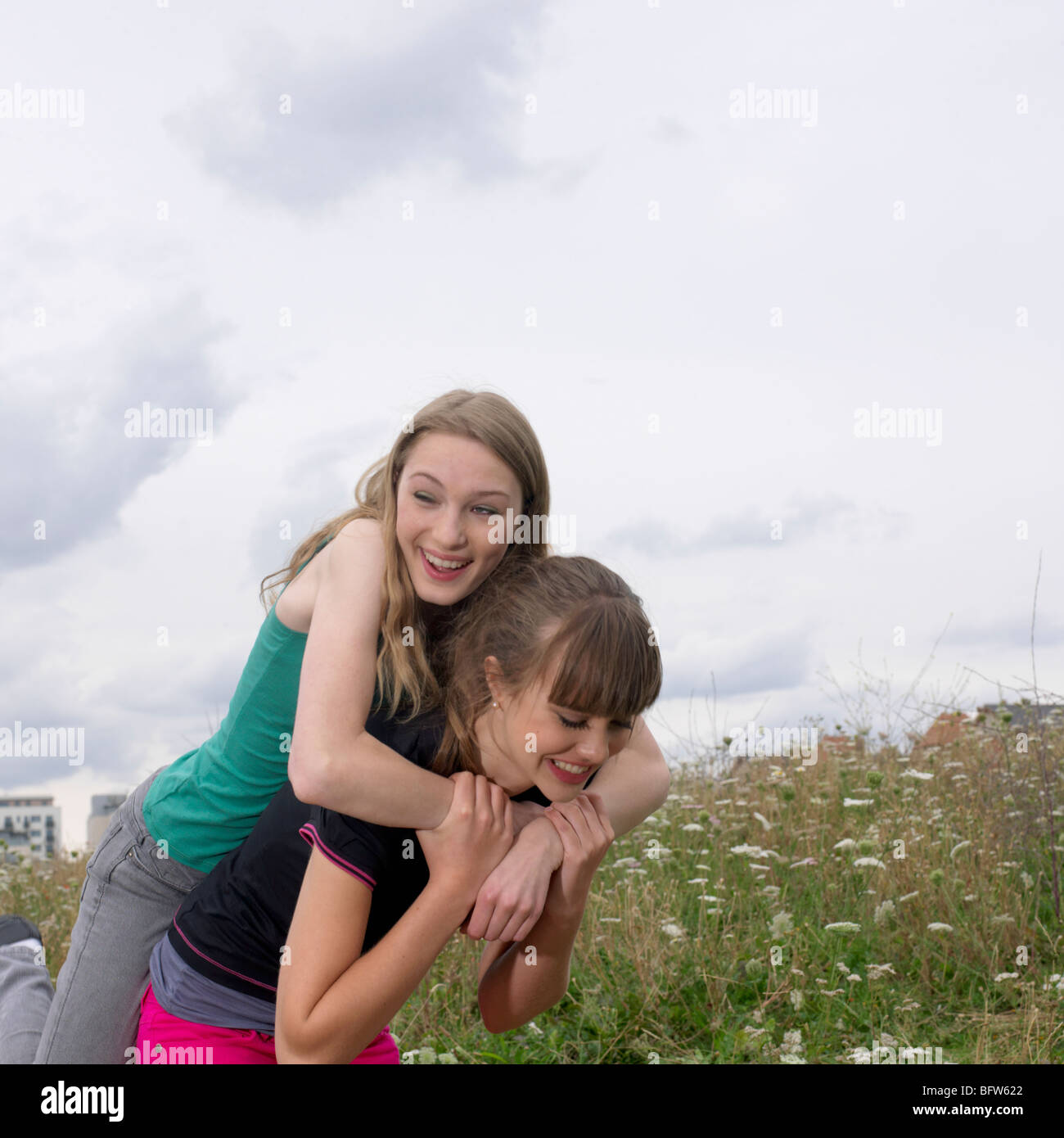 2 young women fooling around Stock Photo