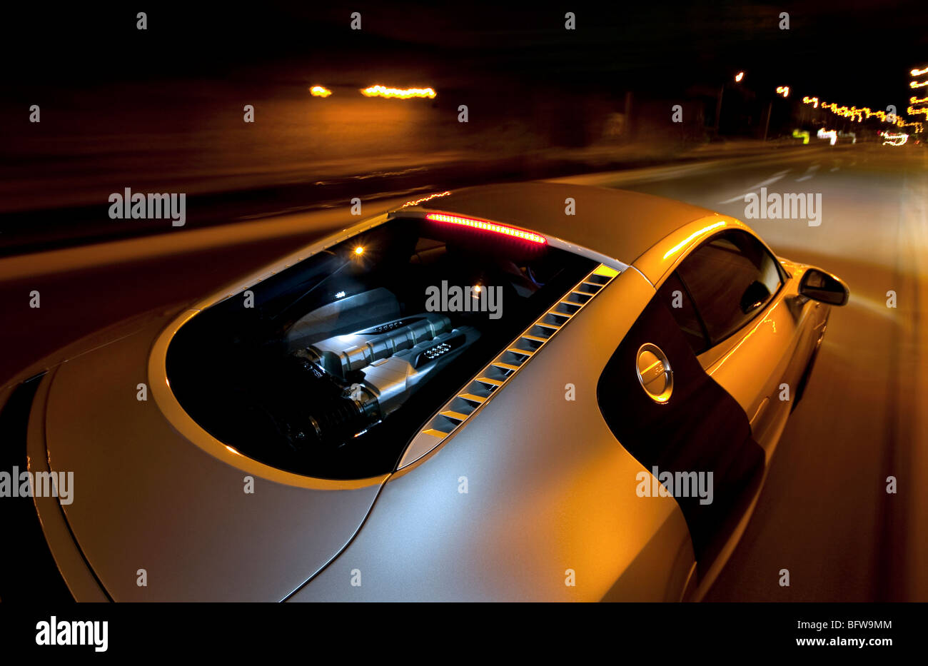 Audi R8 V10 driving at night V10 engine Stock Photo