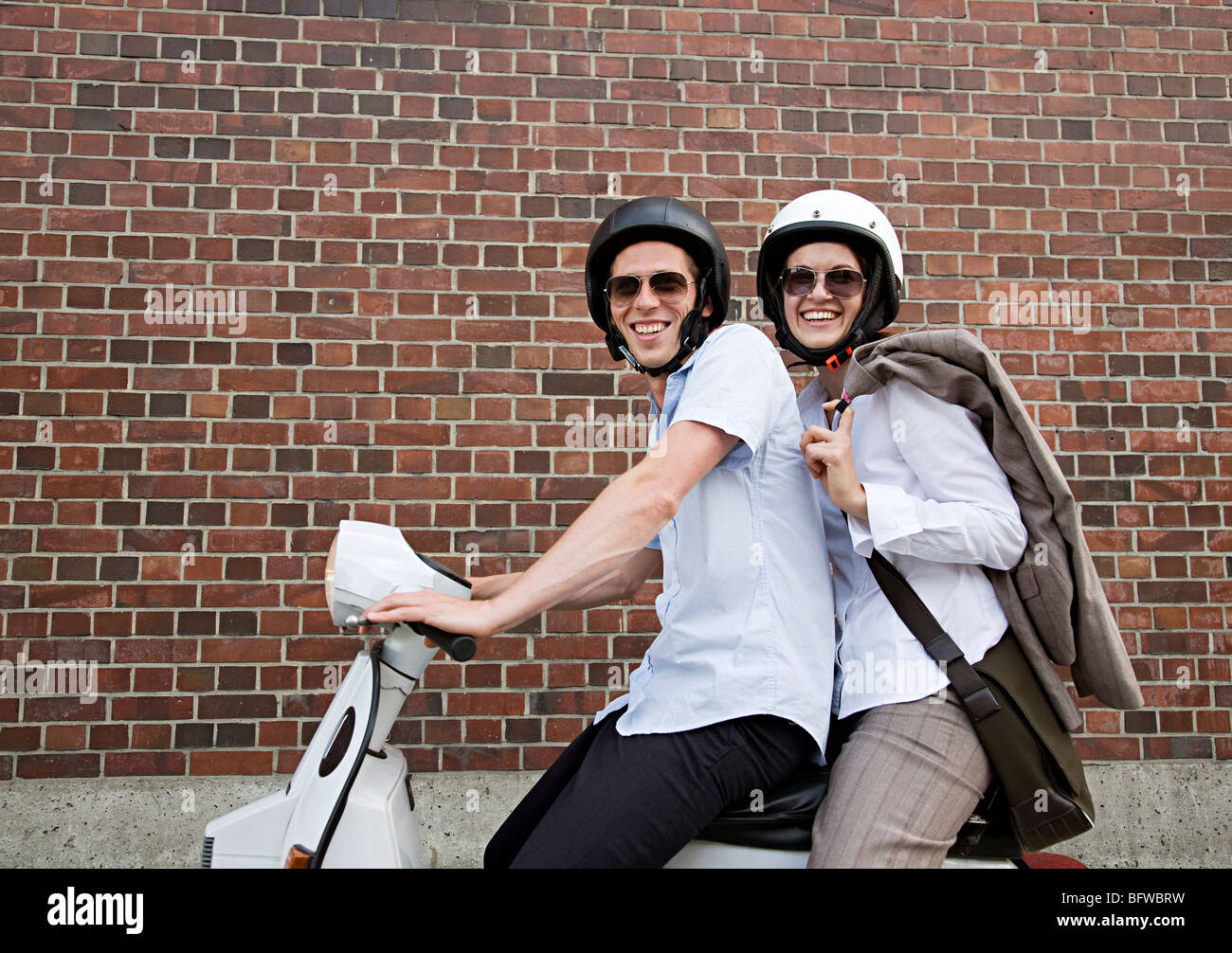 couple on scooter Stock Photo