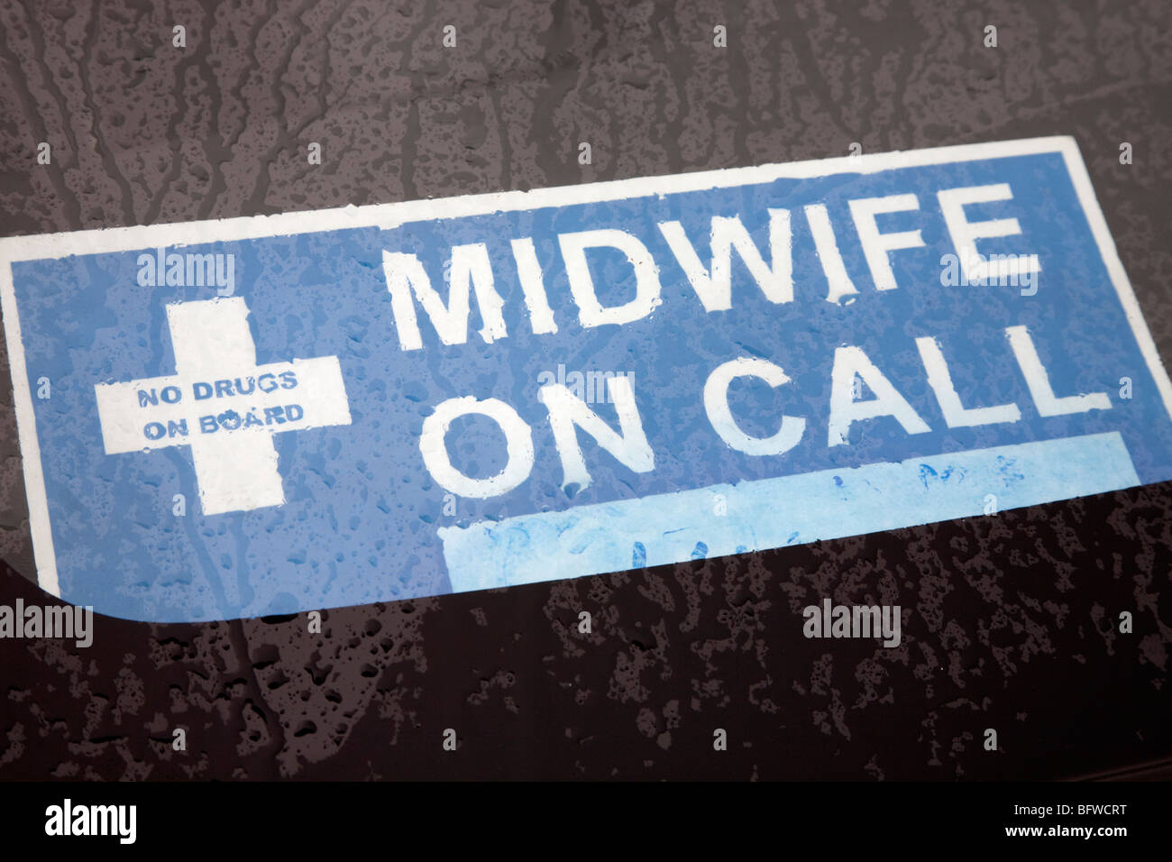 Midwife Nurse On Call Sign On Windscreen Of Car London Stock Photo
