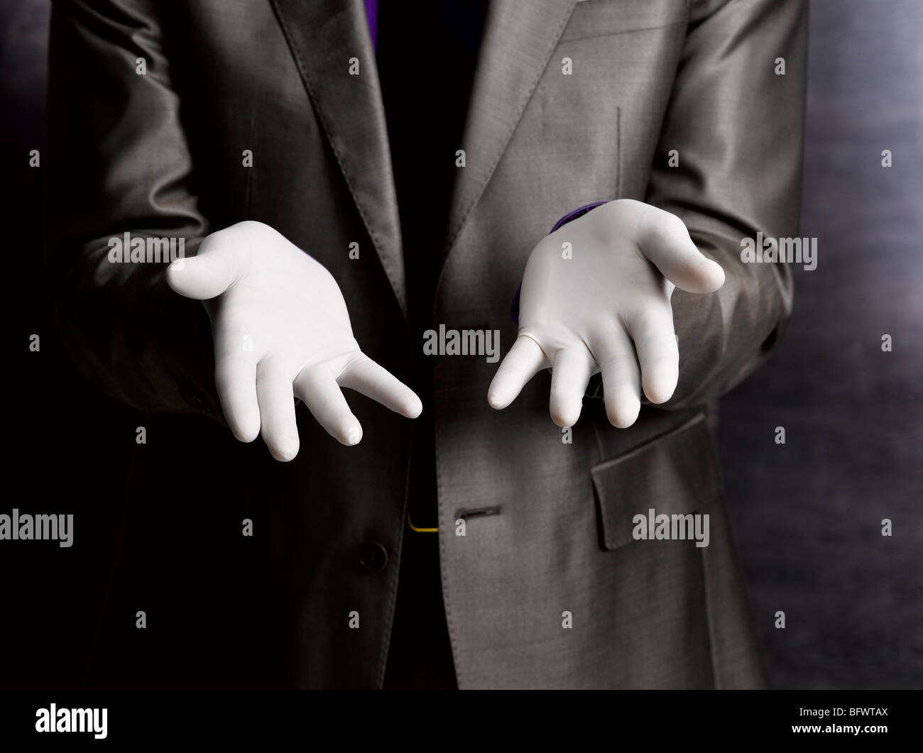 Business man wearing rubber gloves Stock Photo Alamy