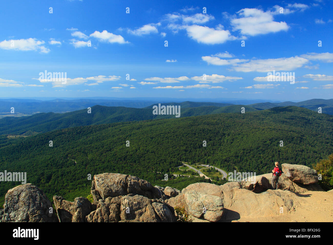 Hiker on Appalachian Trail on Mary's Rock, Shenandoah National Park, Virginia Stock Photo