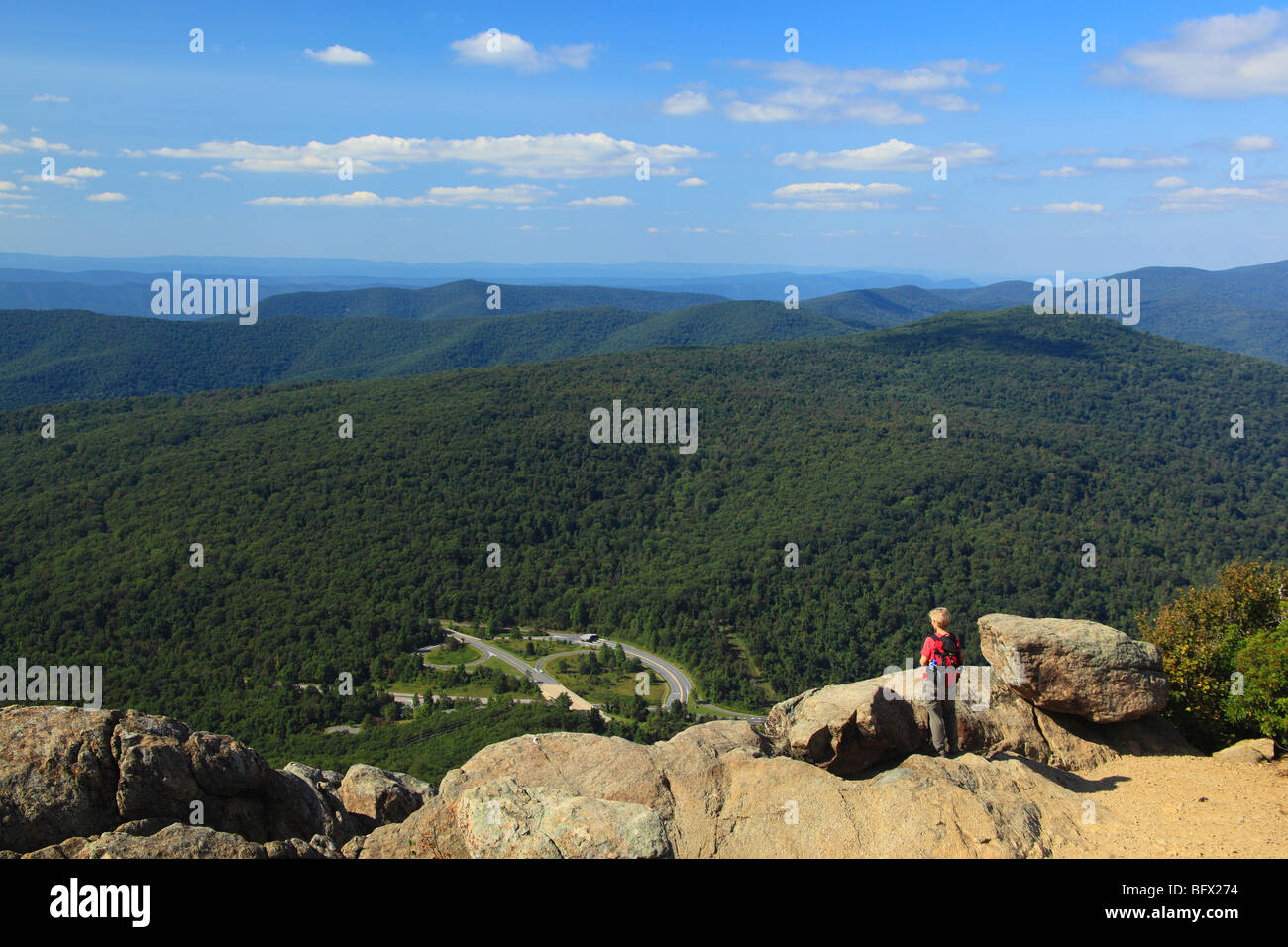 Hiker on Appalachian Trail on Mary's Rock, Shenandoah National Park, Virginia Stock Photo