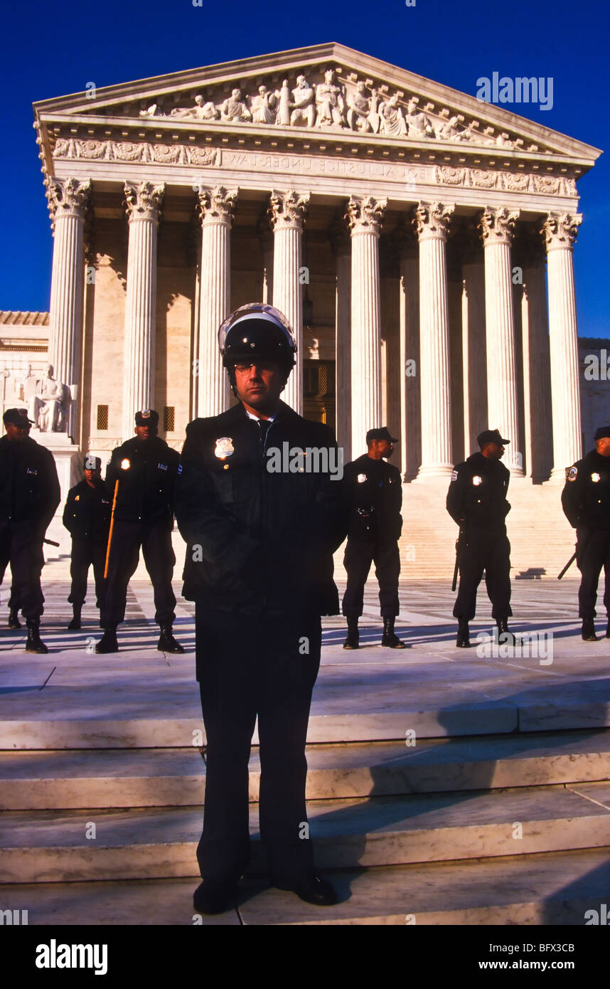 Riot police guard the US Supreme Court during a protest in Washington, DC Stock Photo
