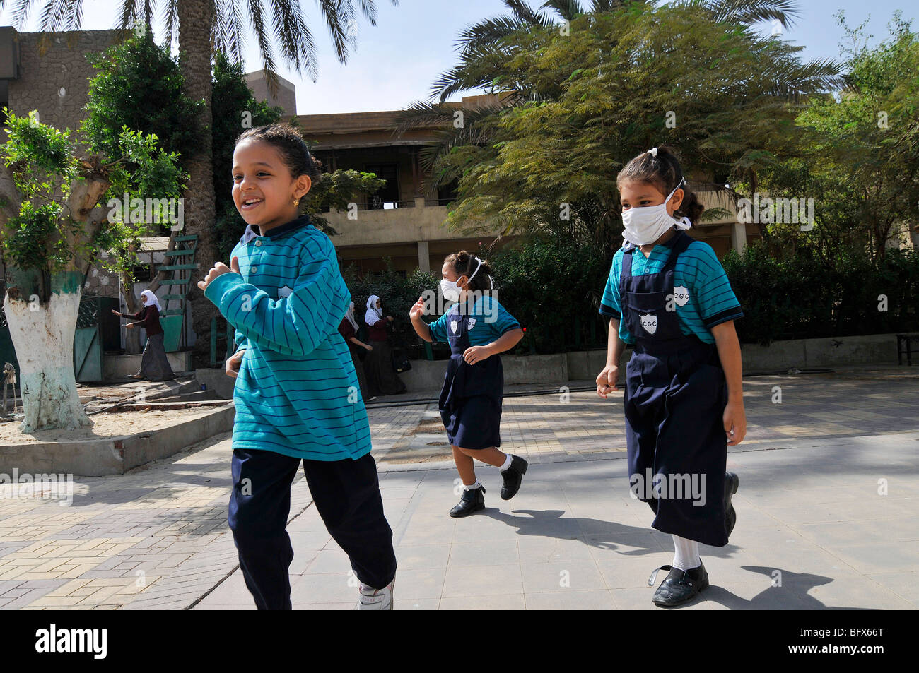 Girls swine flu mask hi-res stock photography and images - Alamy