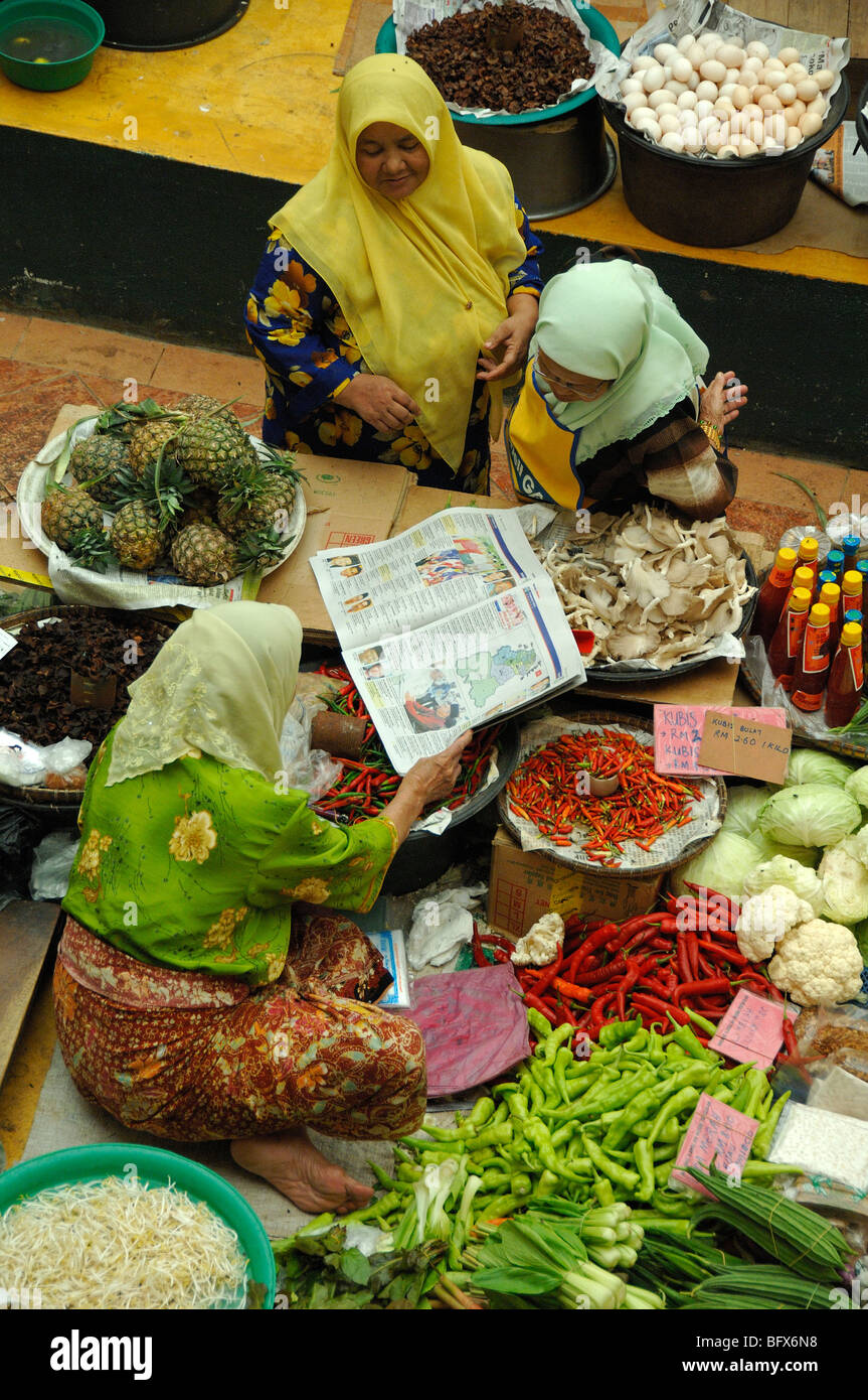 Three Malay or Malaysian Women Discussing Election Results Published in