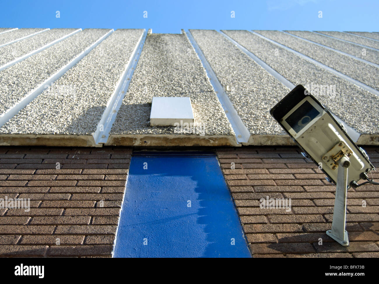 cctv camera fixed to wall of building Stock Photo