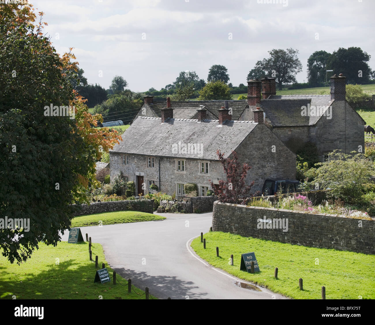 village with houses in countryside tissington, derbyshire, peak