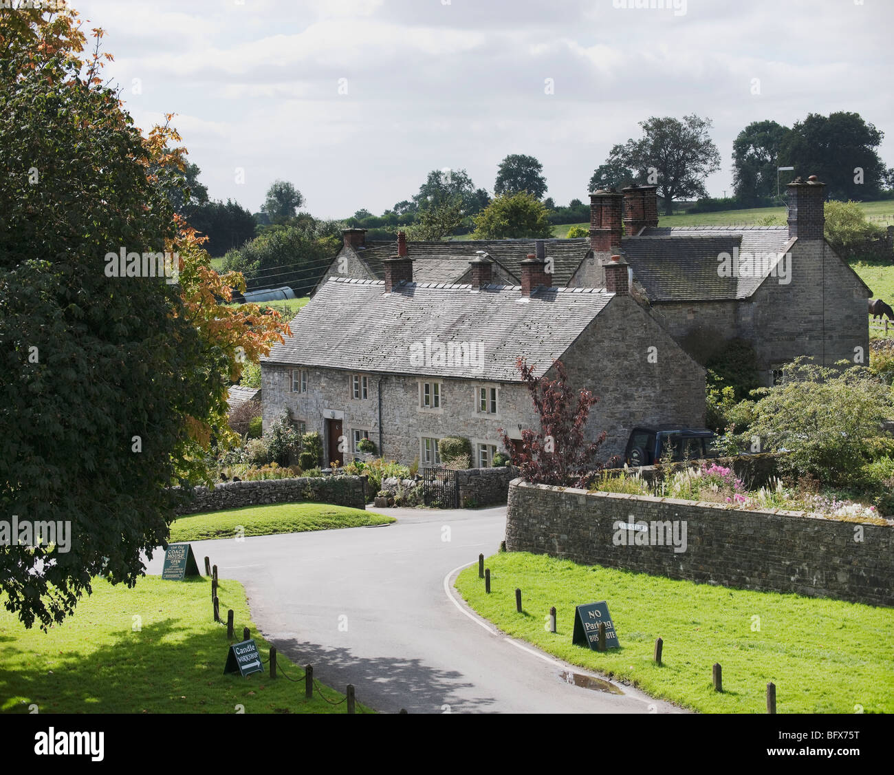 village with houses in countryside - tissington, derbyshire, peak district, national park, england, uk Stock Photo