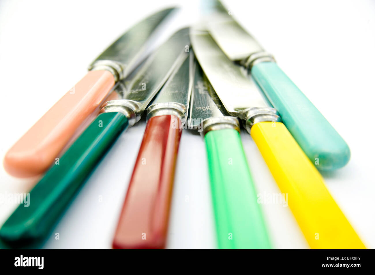 Vintage knives coloured knives 1950's 1960's bone handled knives Stock