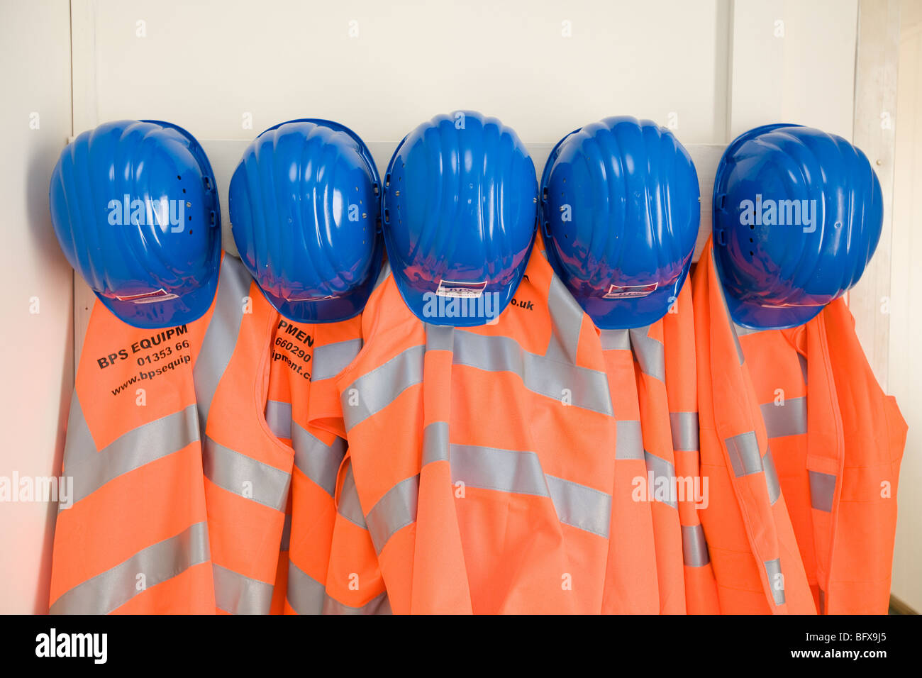 Hard Hats And Fluorescent Safety Jackets Stock Photo