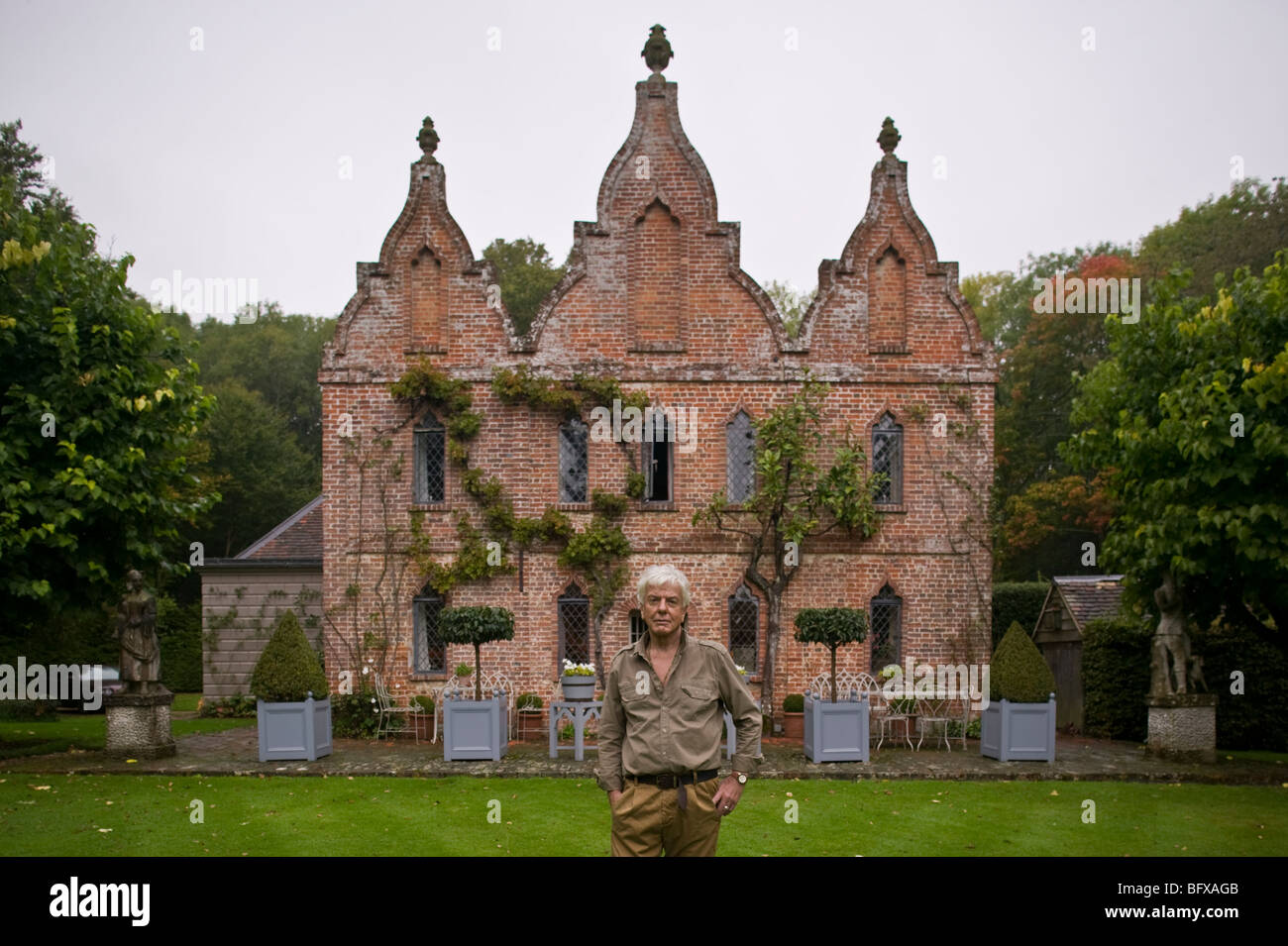 British interior designer 'Nicky Haslam' pictured outside his Hampshire home. Stock Photo