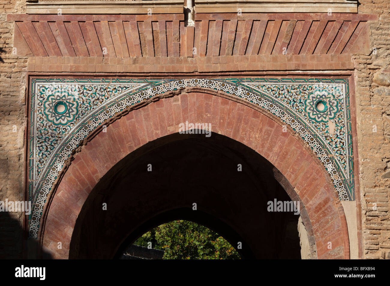 detail of cuerda seca tiles on the Torre del Vino or Puerta del Vino, Alhambra Palace, Granada, Spain Stock Photo