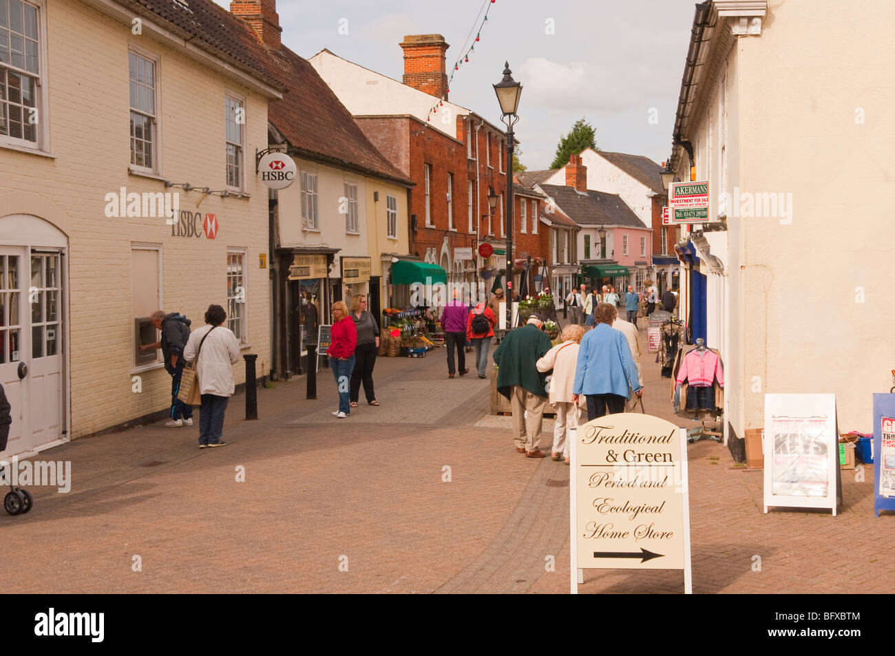 People shopping in the high street in Halesworth,Suffolk,Uk Stock Photo