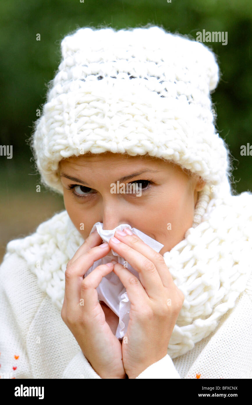 Frau mit einer Erkältung, woman with a cold Stock Photo
