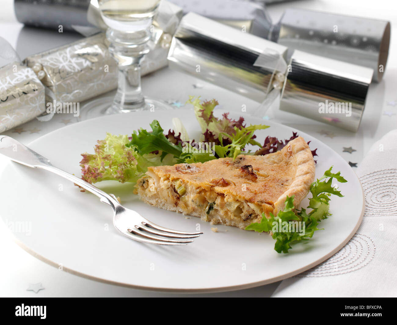 Individual Stilton port leek quiche slice Stock Photo Alamy