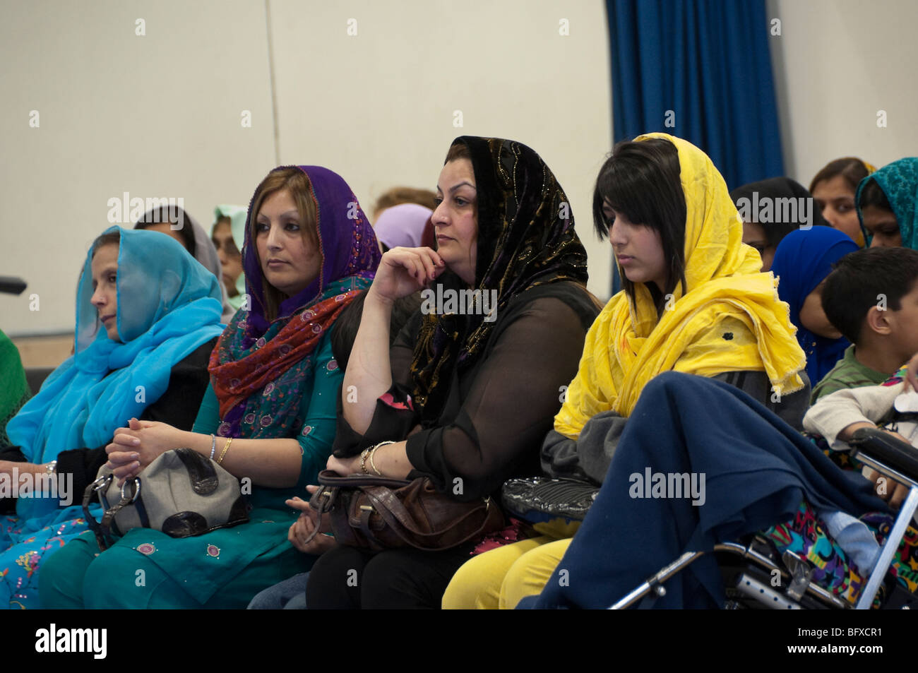 Women in audience at Eid Milad-Un-Nabi Celebrations at Sunni Muslim Association, Tooting, London. Stock Photo